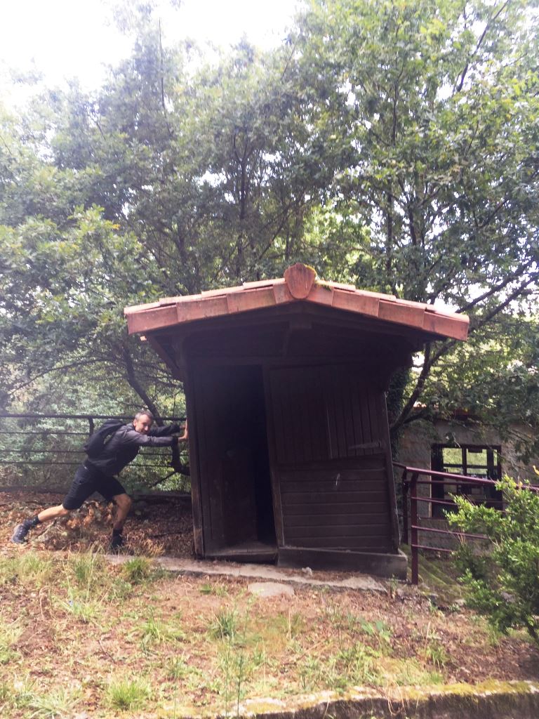 Ben and Nikko Galicia road trip - Nikko pushing a shed